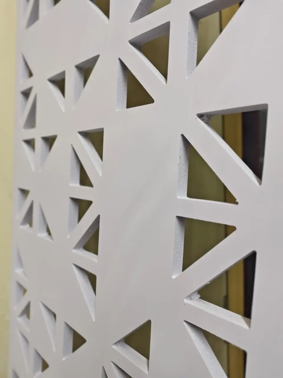CNC-cut WPC panel with geometric triangular jali pattern for decorative partition screens