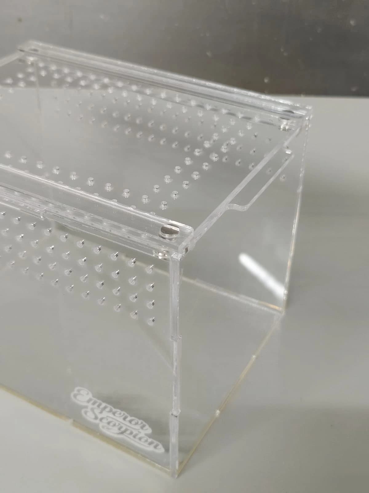 Precision-cut clear acrylic terrarium box with ventilation holes for reptile housing